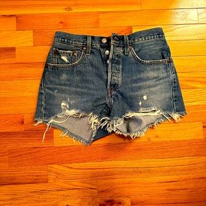 Levi’s distressed 501 shorts by urban outfitters